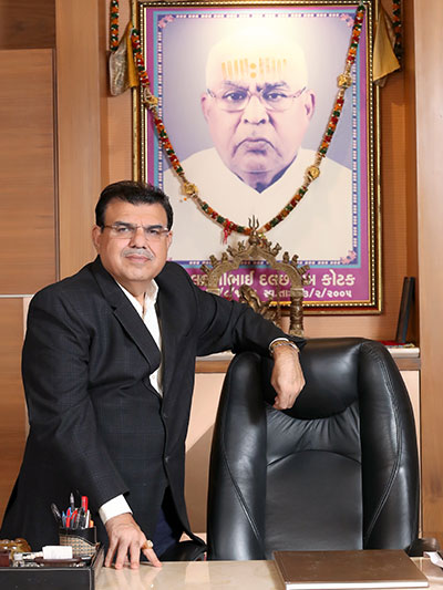 Pravin Kotak at his office – Managing Director of Iscon Group